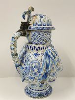 A large faience blue and white pewter mounted Toby pitcher, possible Dutch, 19th century