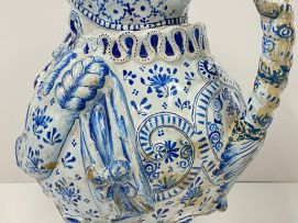 A large faience blue and white pewter mounted Toby pitcher, possible Dutch, 19th century