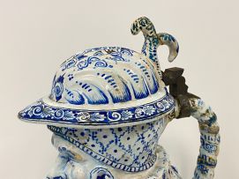 A large faience blue and white pewter mounted Toby pitcher, possible Dutch, 19th century