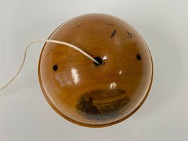 A Scottish treen Mauchlineware string holder, 19th century