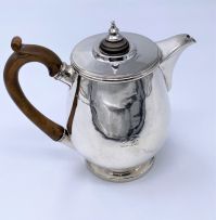 A George IV silver hot water jug, John Cope Folkard, London, 1822