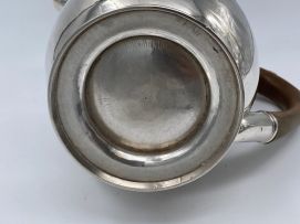 A George IV silver hot water jug, John Cope Folkard, London, 1822