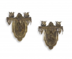 A pair of Gothic-style brass wall sconces, early 20th century
