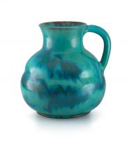A large Linn Ware turquoise-glazed jug